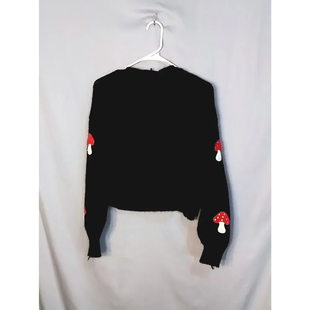 Forever 21 black sweater with red mushrooms.